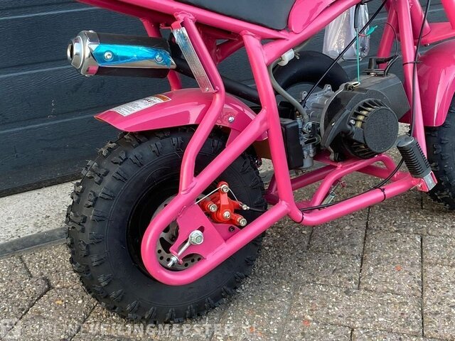 Pink mini bike on sale